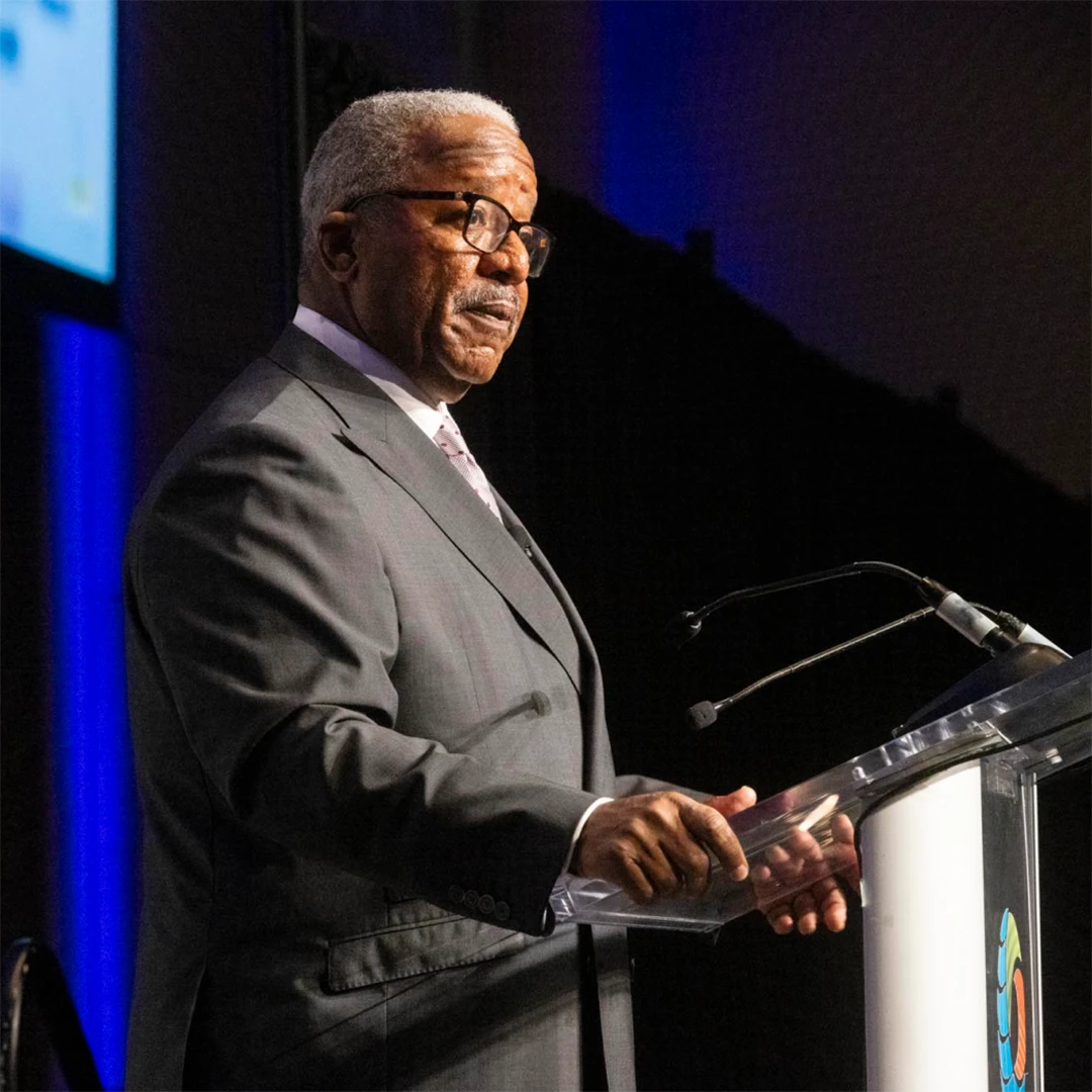 Mayor of West Palm Beach speaking at Chamber event.